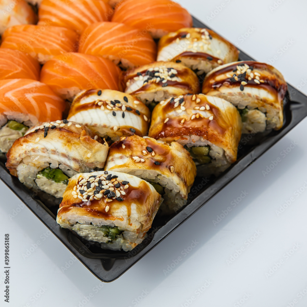 set of roles of Japanese cuisine. From smoked salmon, eel, tuna
set of roles of Japanese cuisine. From smoked salmon, eel, tuna