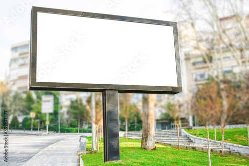 Blank billboard mock up, public information board with copy space on the street, empty banner for your advertising, clear poster in city.