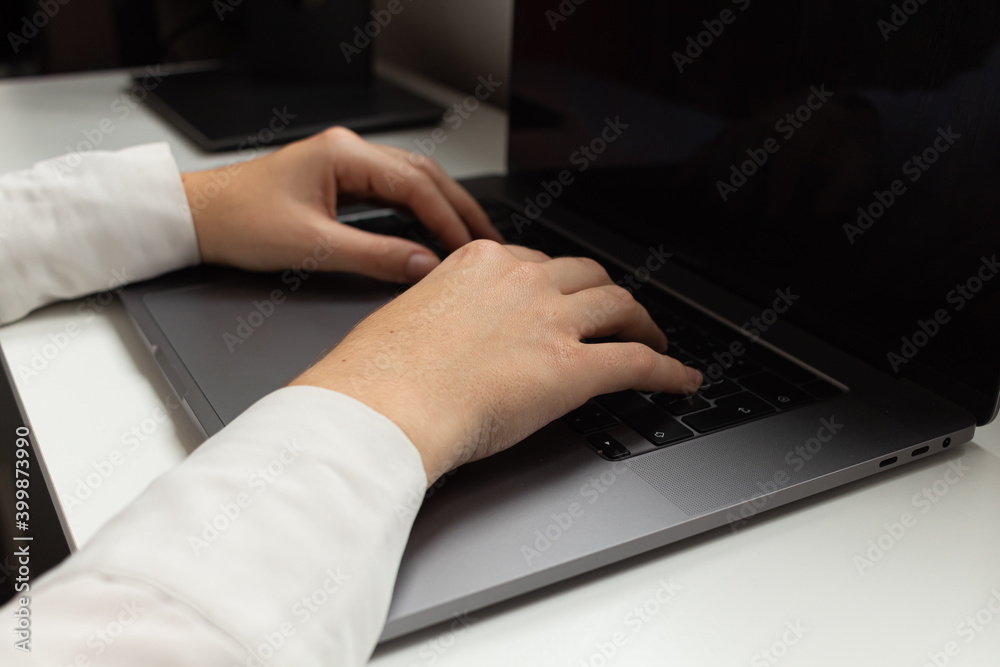 Detail picture of the hands of a woman who is working from home due to coronavirus outbreak Detail picture of the hands of a woman who is working from home due to coronavirus outbreak