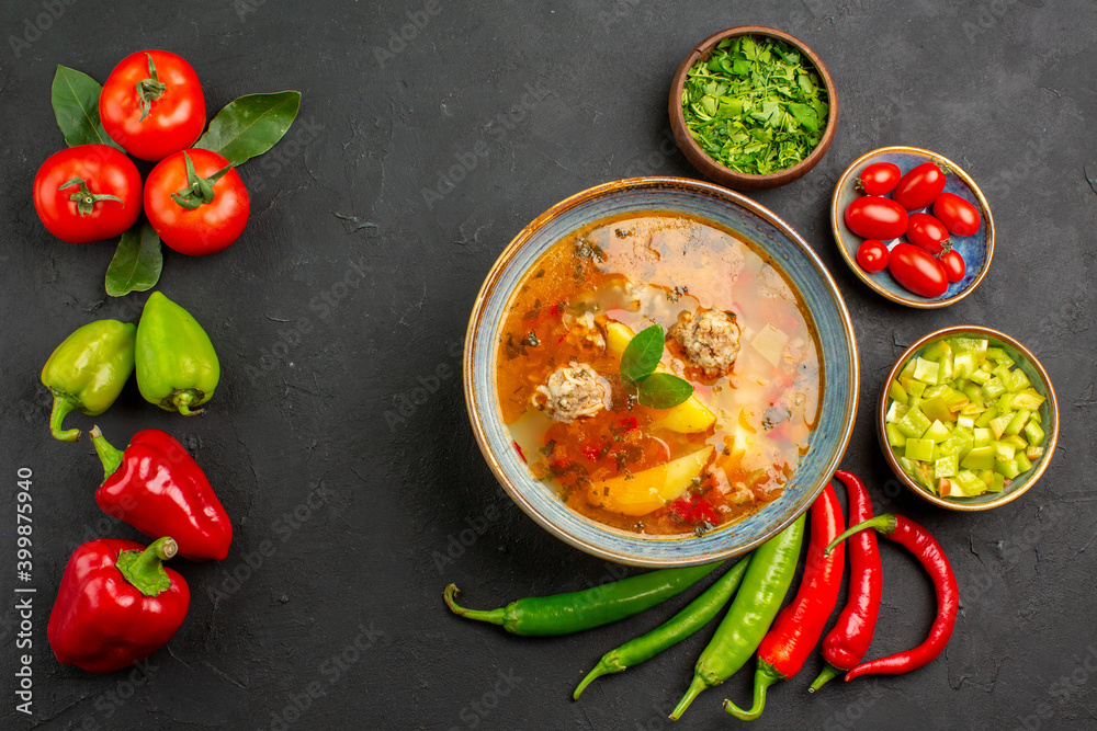 top view tasty meatballs soup with greens and pepper on dark floor sauce dish color top view tasty meatballs soup with greens and pepper on dark floor sauce dish color