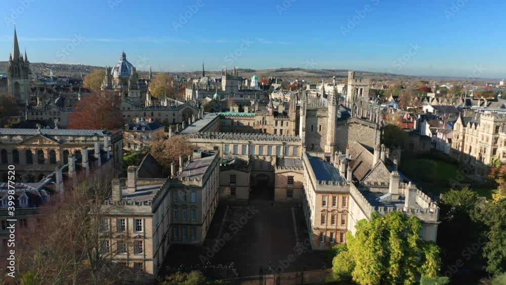 New College, Oxford, United Kingdom. Aerial view of striking architecture of central Oxford. Popular television and movie buildings - view from above. High quality 4k footage New College, Oxford, United Kingdom. Aerial view of striking architecture of central Oxford. Popular television and movie buildings - view from above. High quality 4k footage