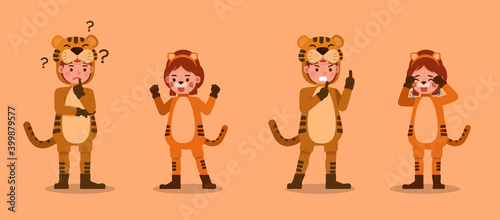 Boy and girl wearing tiger costumes character vector design. Presentation in various action with emotions. no13 photo
