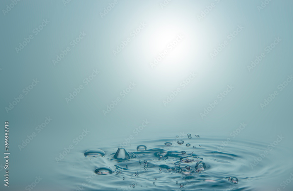 Blur the water droplets that fall on the water surface, creating beautiful ripples on the light blue water surface. Blur the water droplets that fall on the water surface, creating beautiful ripples on the light blue water surface.