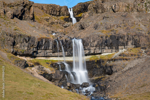Waterfall Bergarfoss in Hornafjordur in south Icelandic countryside
