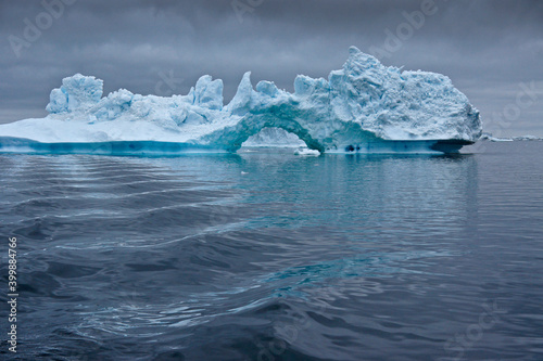 Iceberg arch in Disko Bay, Ilulissat, West Greenland