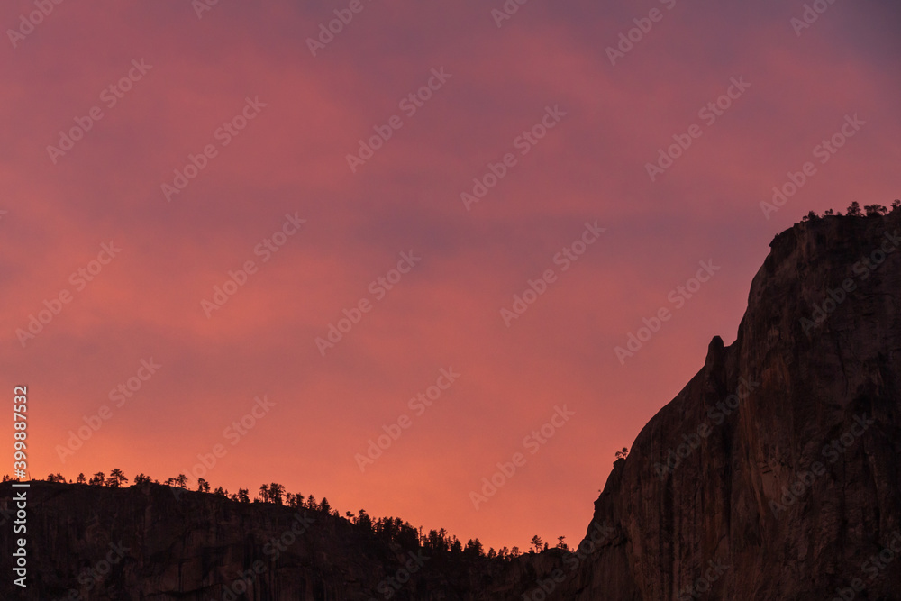 A vibrant, colorful mountain sunset in Yosemite