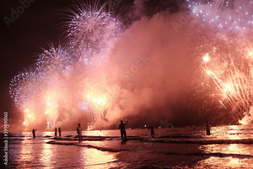 fireworks over water of Santos beach during the New Years eve