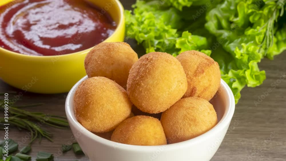 Brazilian appetizer deep fried cheese croquette - Bolinha de queijo Brazilian appetizer deep fried cheese croquette - Bolinha de queijo