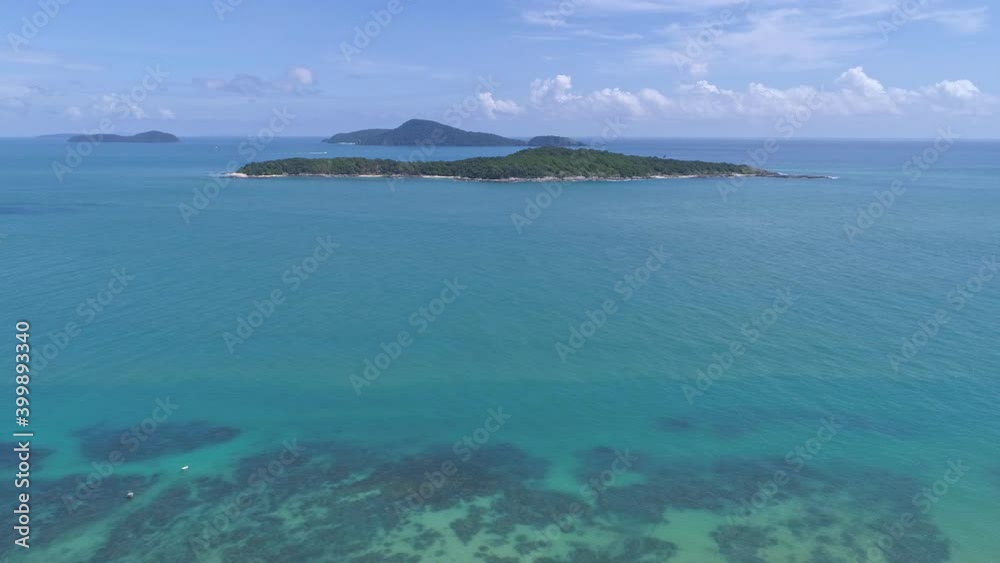 Aerial video over tropical sea Beautiful island and turquoise sea in Phuket island,Amazing turquoise and transparent sea,Phuket Island is famous tourist destination at asia Aerial video over tropical sea Beautiful island and turquoise sea in Phuket island,Amazing turquoise and transparent sea,Phuket Island is famous tourist destination at asia