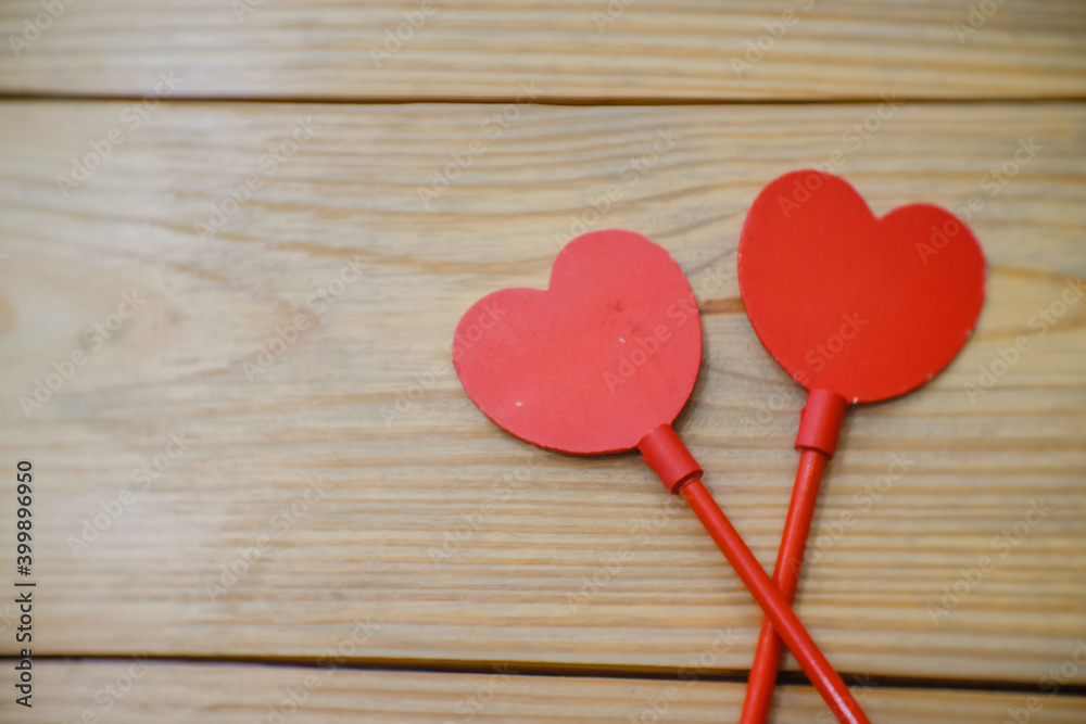 Red hearts on the table.