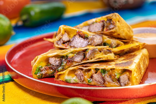 Steak Quesadilla on a red plate