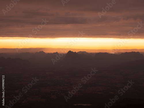 charming sunrise sky limestone mountain landscape at  at Pha Nok An cliff. Phu Kradueng © PixHound