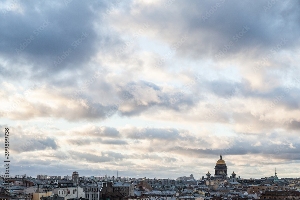 Cityscape of Saint Petersburg over the building roofs in a cloudy day