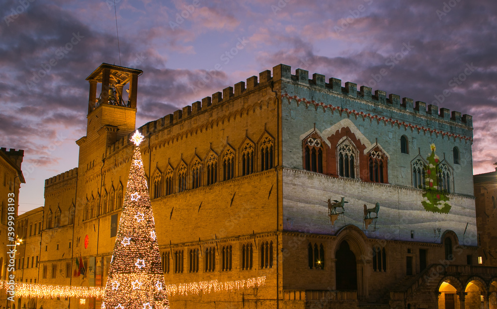 Romantic view of the main square of Perugia (Piazza IV Novembre) at christmas time during sunset