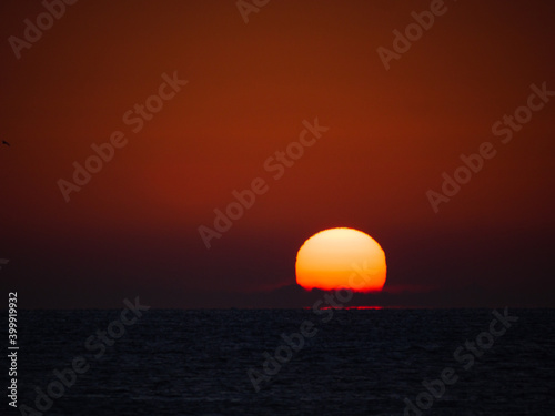 Sunrise over sea © Voyagerix