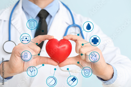 Male cardiologist with red ...