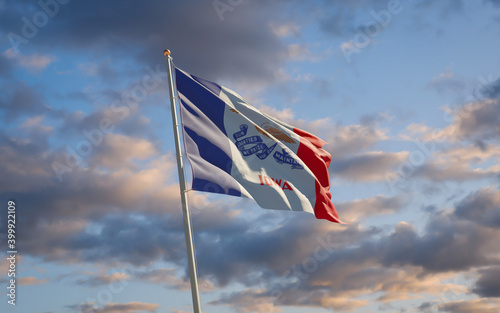 Iowa US State Flag at sky background