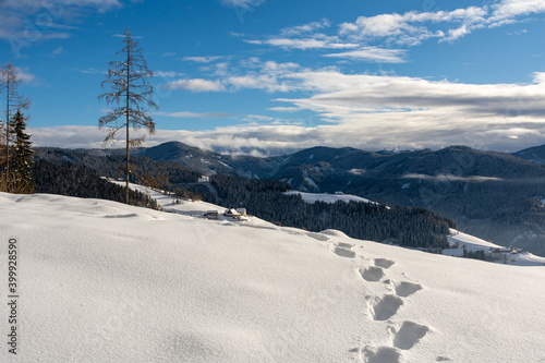 Footprints in the snow on a mountain, Kleinlobming, Austria © Alexander