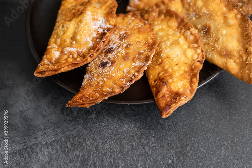 Close up of Trucha, fried pasty filled with cabell angel or sweet potatoes and consumed in the Canary Islands during the Christmas