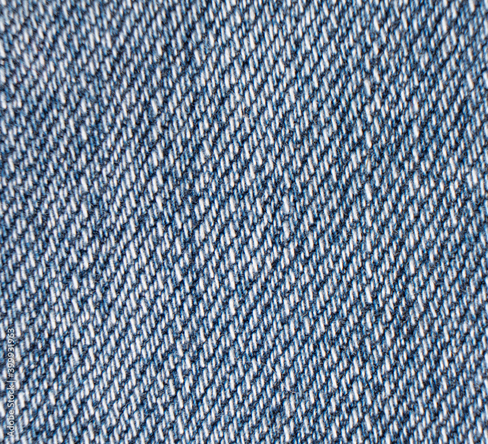 Foto de Macro shot Blue jeans fabric texture background. Denim jeans  texture. Closeup texture and pattern of jeans fabric do Stock | Adobe Stock