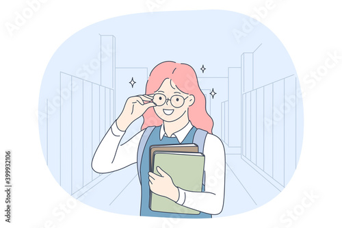 Success in studying, excellent school pupils concept. Smiling school girl cartoon character in glasses standing with books, having excellent marks for educational exams and showing good knowledge 