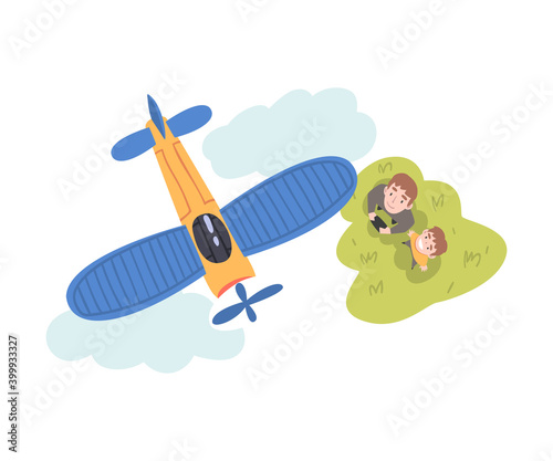 Dad and his Son Launching Airplane Model, Parent and Son Spending Time Together Outdoors Cartoon Style Vector Illustration