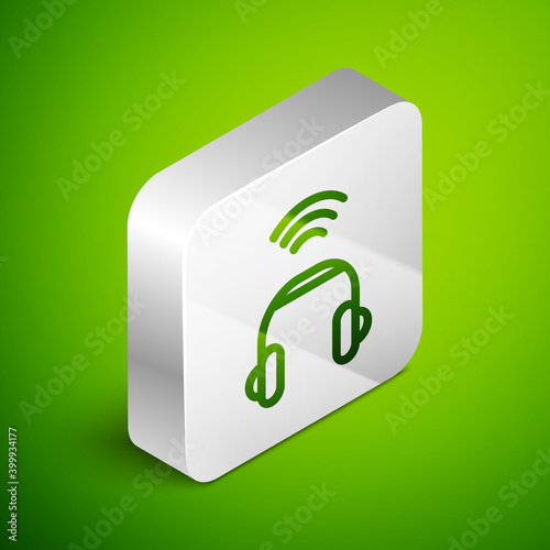 Isometric line Smart headphones system icon isolated on green background. Internet of things concept with wireless connection. Silver square button. Vector.
