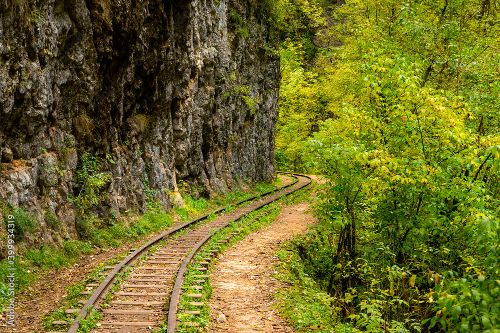Old narrow gauge railway in mountain region. Old narrow gauge railway in mountain region.