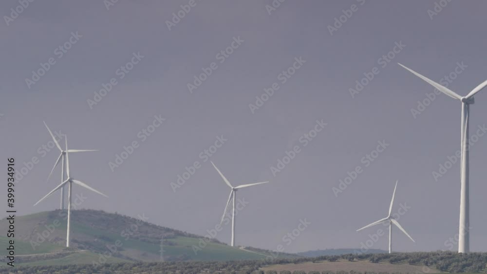 Wind turbines on hills. Power generator farm for renewable electric energy production near Ardales, province Malaga, Andalusia Spain. Wind turbines on hills. Power generator farm for renewable electric energy production near Ardales, province Malaga, Andalusia Spain.