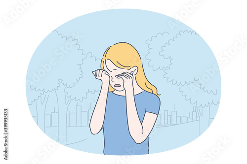 Grief, Depression, tears concept. Small unhappy girl cartoon character standing outdoors and touching eyes while crying and feeling totally depressed with something vector illustration 