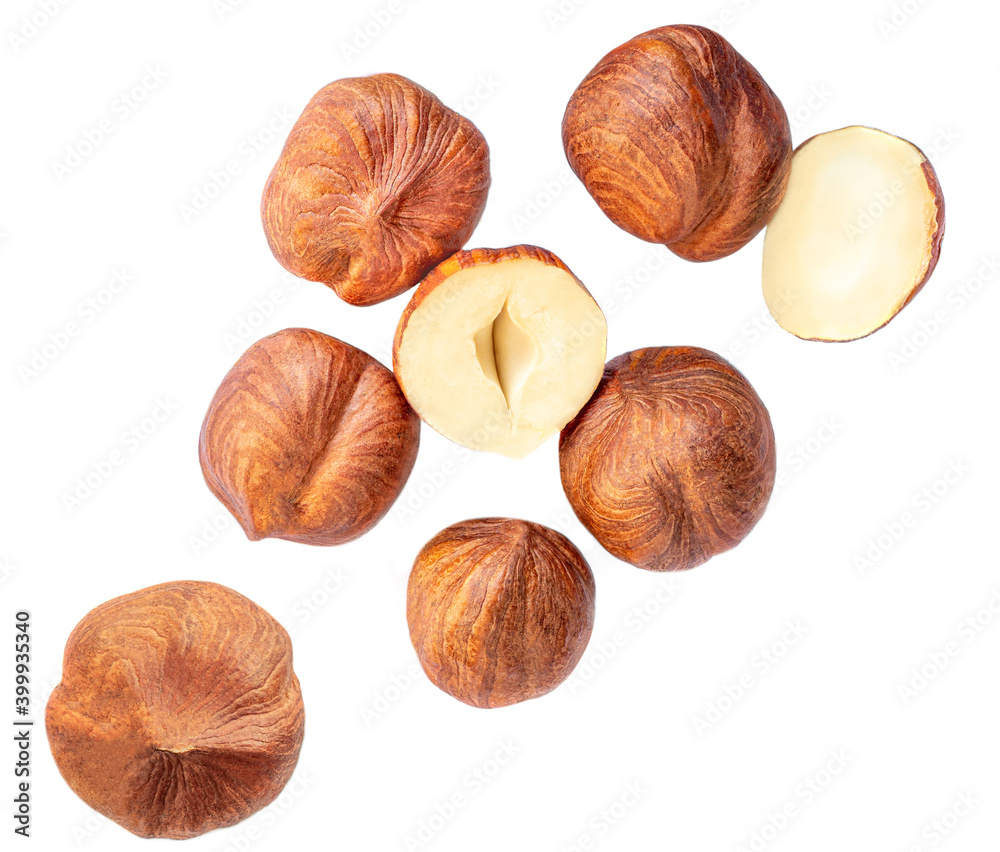 Flying Hazelnuts isolated on white background. Top view. Flat lay. Flying Hazelnuts isolated on white background. Top view. Flat lay.