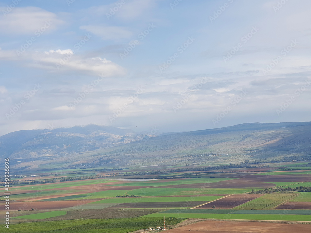 A view on the Hula valley, Golan heights and Mount Hermon with snow on top, Israel landscape