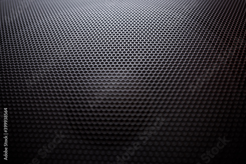 Shiny metal grate as a background.