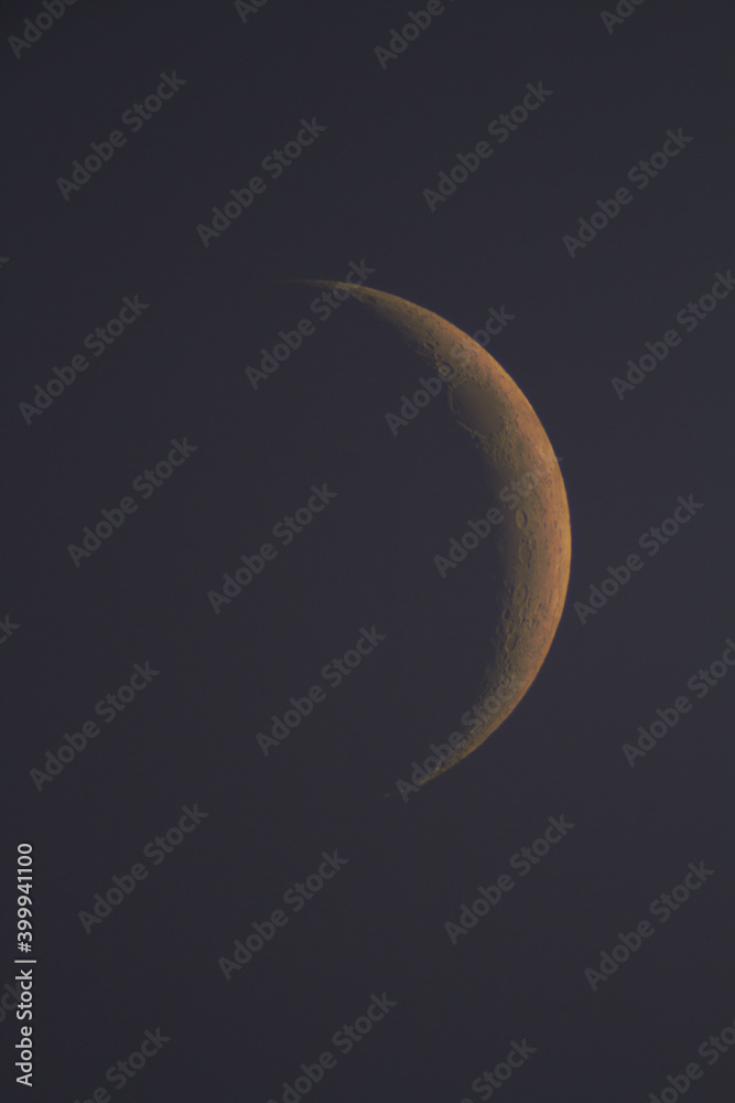 Young Moon photographed through a long focal telescope. Young Moon photographed through a long focal telescope.