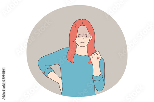 Anger, rage, furious woman concept. Young angry furious female cartoon character standing and showing fist during scandal or fighting with somebody vector illustration
