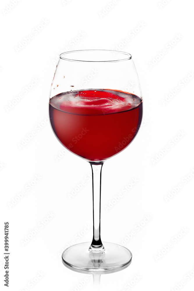 Glass glass with red wine with a splash on a white background Glass glass with red wine with a splash on a white background
