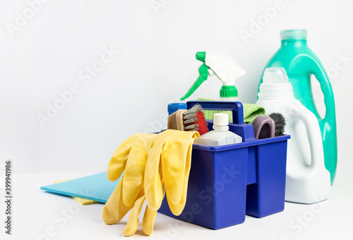Cleaning gloves and various bottles with detergent