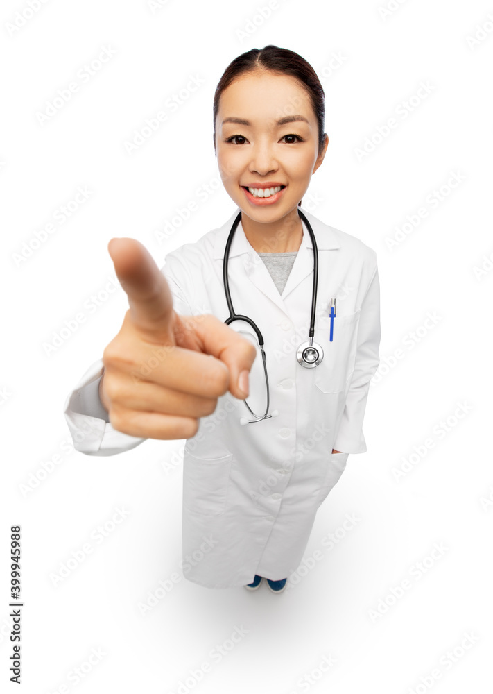 medicine, profession and healthcare concept - happy smiling asian female doctor with stethoscope in white coat pointing to camera medicine, profession and healthcare concept - happy smiling asian female doctor with stethoscope in white coat pointing to camera