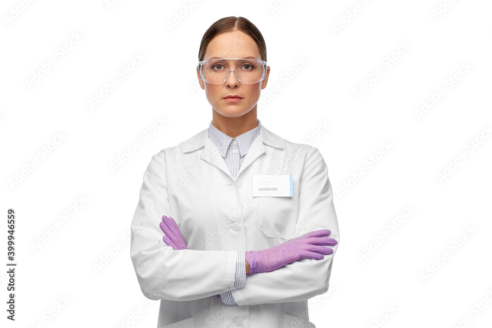 science and profession concept - female scientist in goggles and gloves with nametag on lab coat science and profession concept - female scientist in goggles and gloves with nametag on lab coat