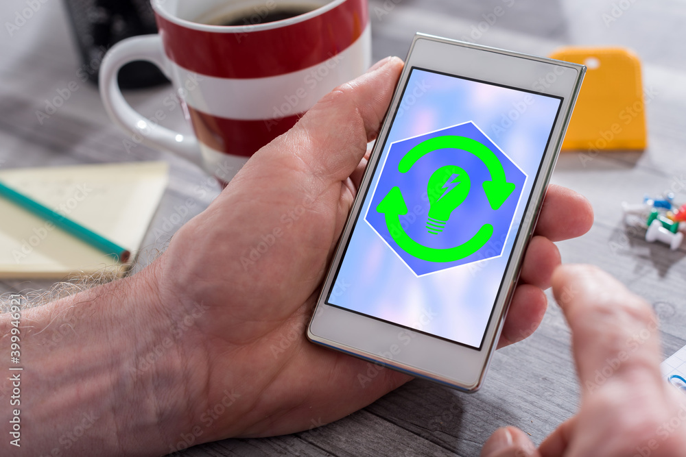 Fototapeta premium Renewable energy concept on a smartphone