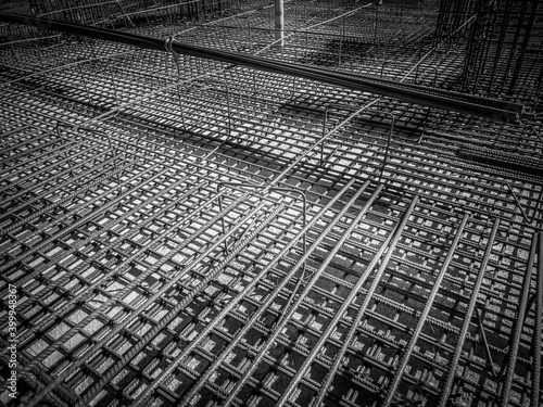 Steel Rebars for reinforced concrete. Closeup of Steel rebars. Geometric alignment of Rebars on construction site
