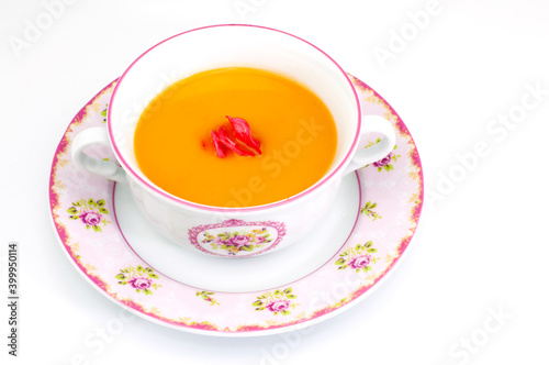 Delicious vegetable soup in bowl on white background