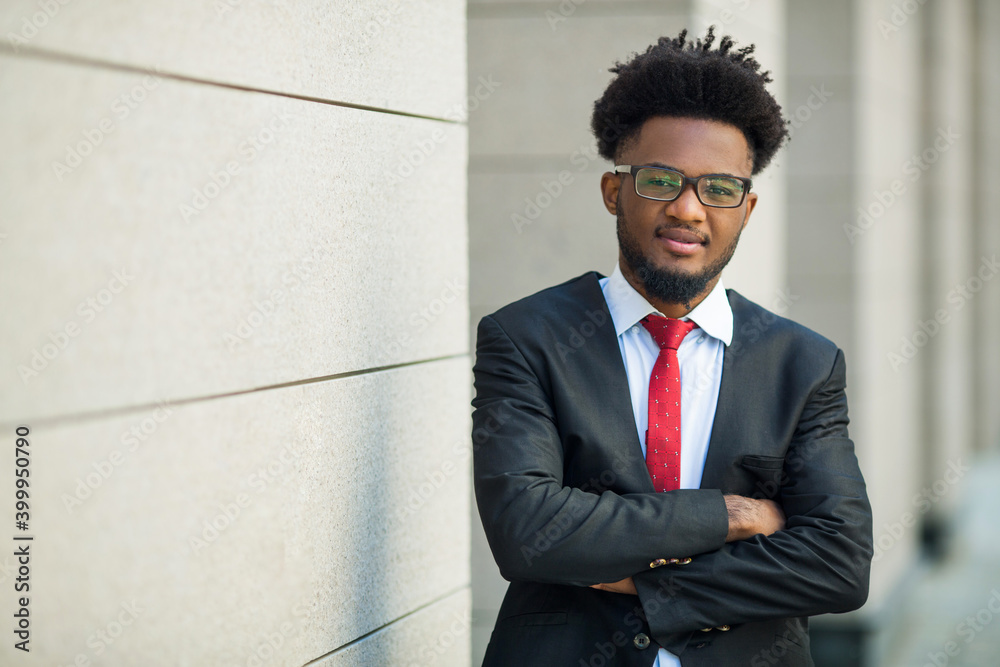 handsome young african man in suit and glasses handsome young african man in suit and glasses