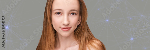 Cosmetology concept. Skin care product. Female portrait. Face mask. Home peeling. Grey background. Copyspace. Facial lifting treatment. Dermatology beauty model. Young girl. Technology