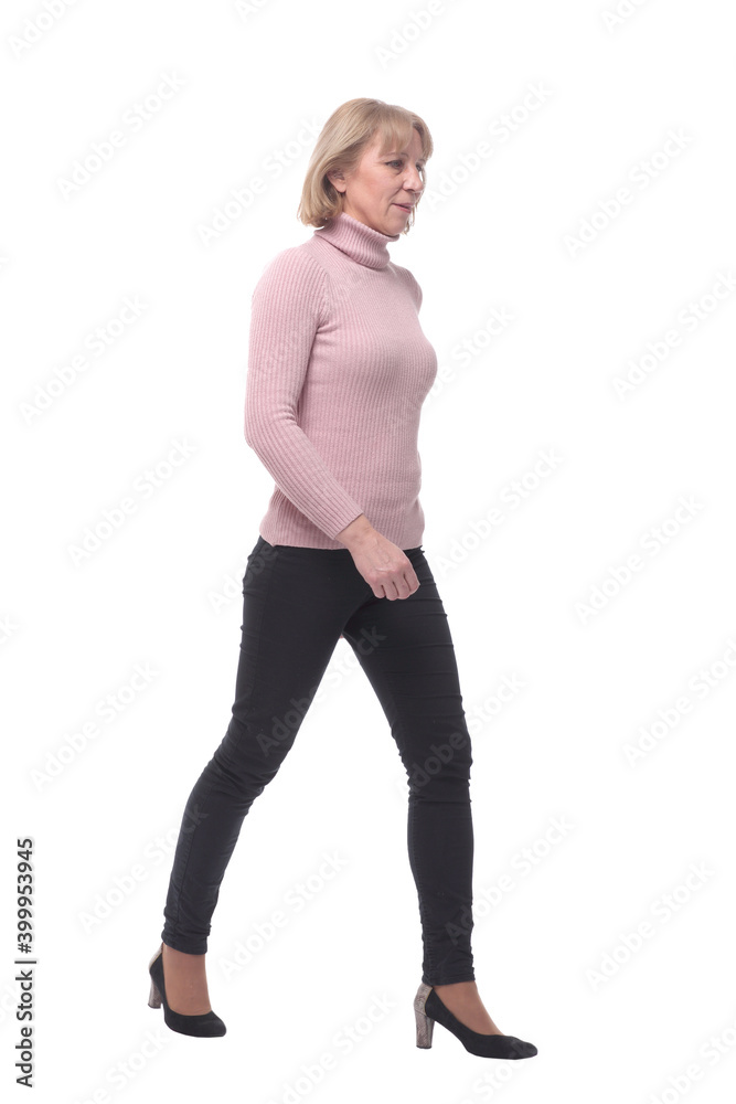Business woman walking isolated over a white background Business woman walking isolated over a white background