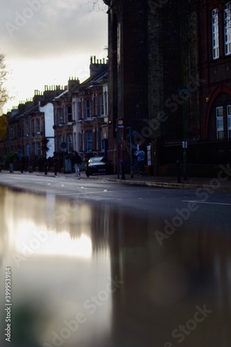 City street reflected in water 
