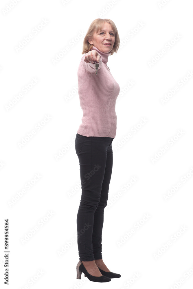 Side view of happy smiling business woman or real estate agent showing keys from new house Side view of happy smiling business woman or real estate agent showing keys from new house