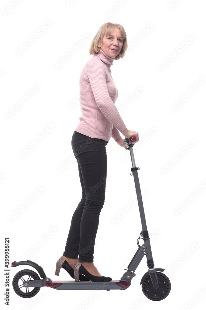 Beautiful woman riding an electric scooter isolated on white background Beautiful woman riding an electric scooter isolated on white background