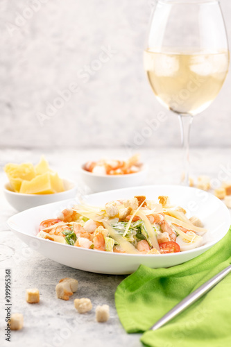 Shrimp salad with fresh vegetables, cheese and croutons.