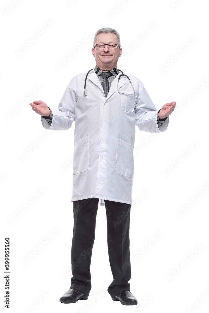 Handsome confident male doctor or surgeon standing in a white coat with a tie and a stethoscope around his neck Handsome confident male doctor or surgeon standing in a white coat with a tie and a stethoscope around his neck